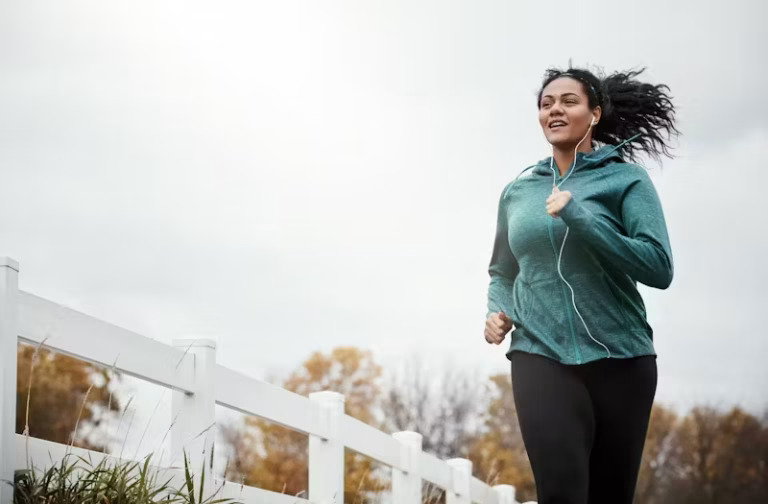 Woman running in a park representing healthy weight loss with GLP-1 at Valley Medical Weight Loss