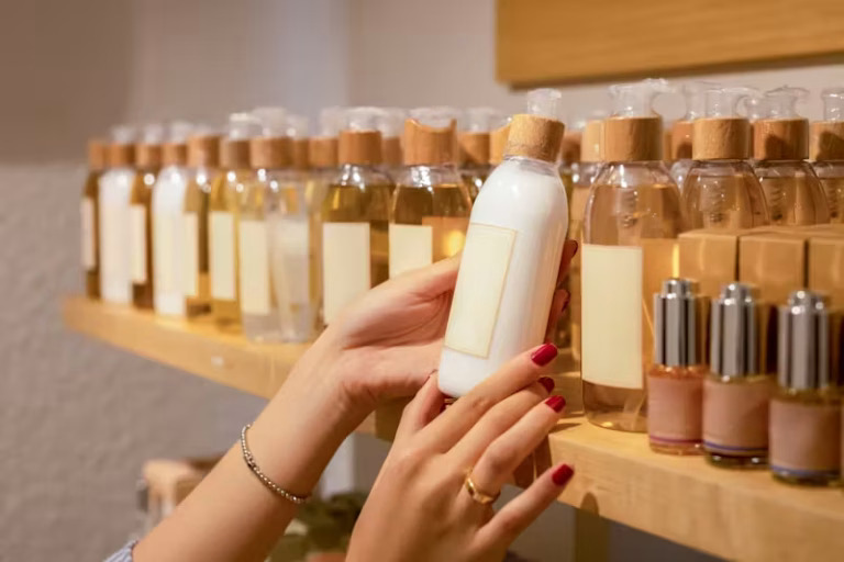 Woman selecting expensive skincare products at Valley Medical Weight Loss med spa
