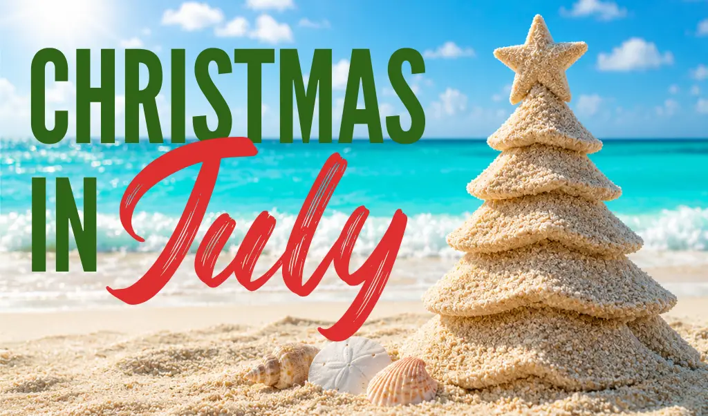 Graphic reading 'Christmas in Italy' on a sunny beach with a layered sand Christmas tree and seashells in the foreground.
